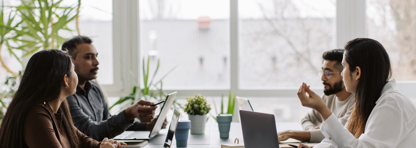 Employees talking in workplace